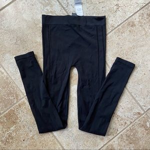 Bebe Black Leggings with cutout print